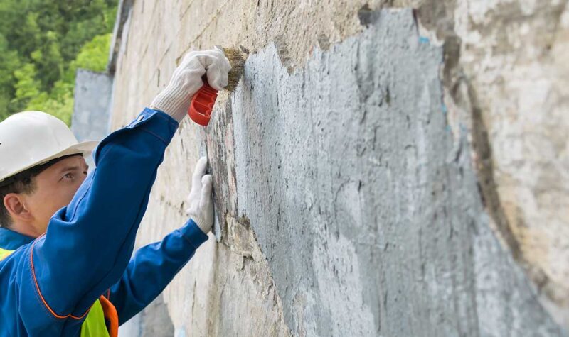 Come rimuovere vernice e graffiti dai muri esterni?